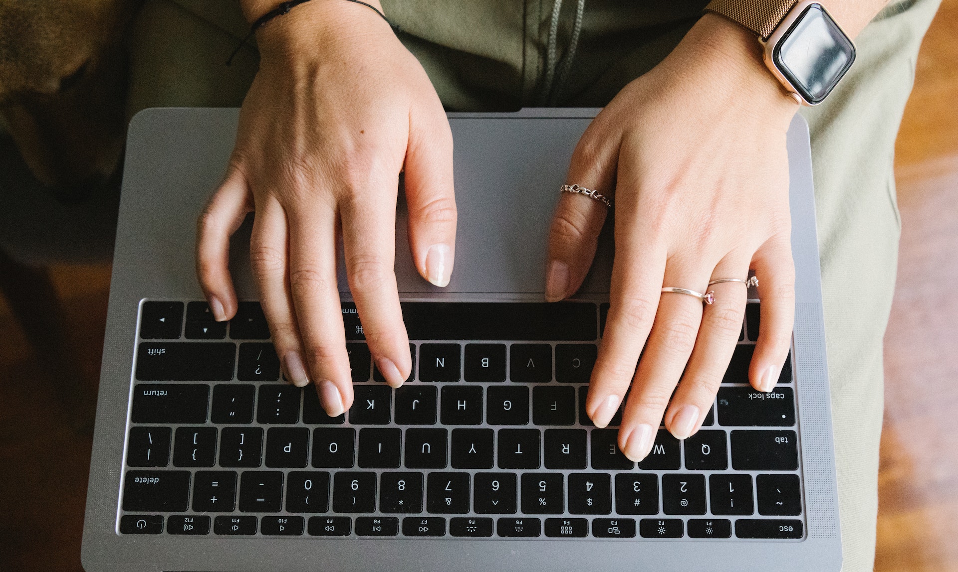 A person doing research on a laptop computer.